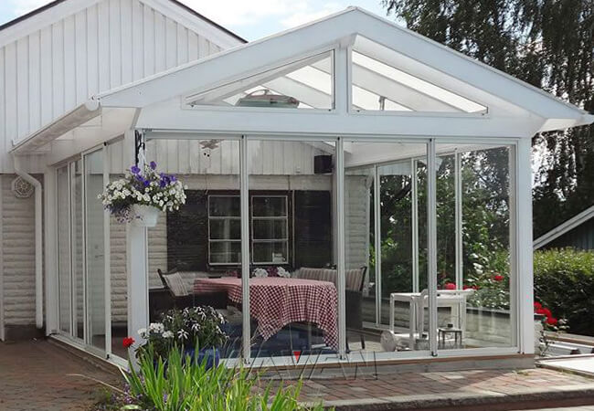 Errichten Sie einen Giebel-Dach Sunroom modernen Sunroom-Erweiterungs-Zusatz, der zum Haus befestigt wird 3